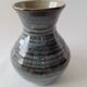 Small blue enamelled vase
