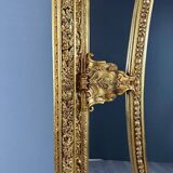 Grand miroir style Louis XV en bois sculpté et doré, XIXe siècle