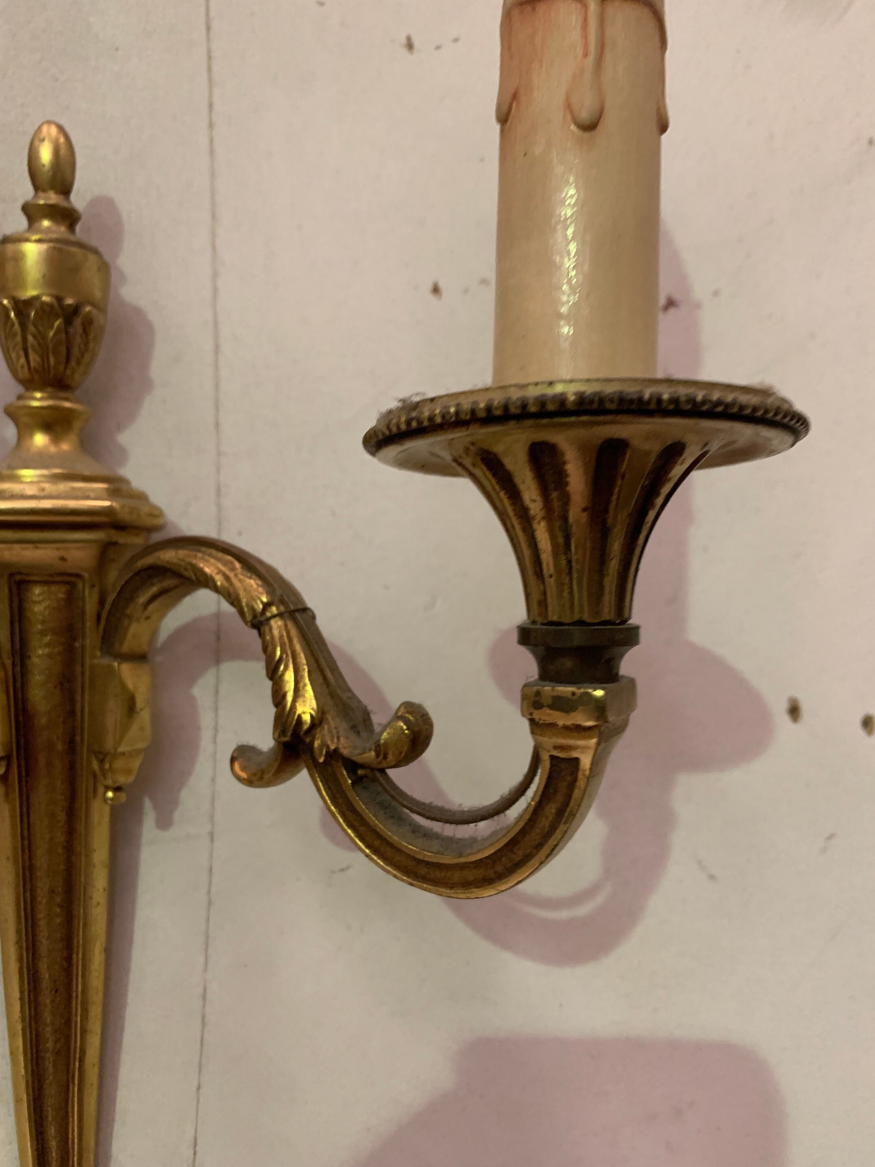 Pair of Louis XV style sconces in gilded bronze XX century
