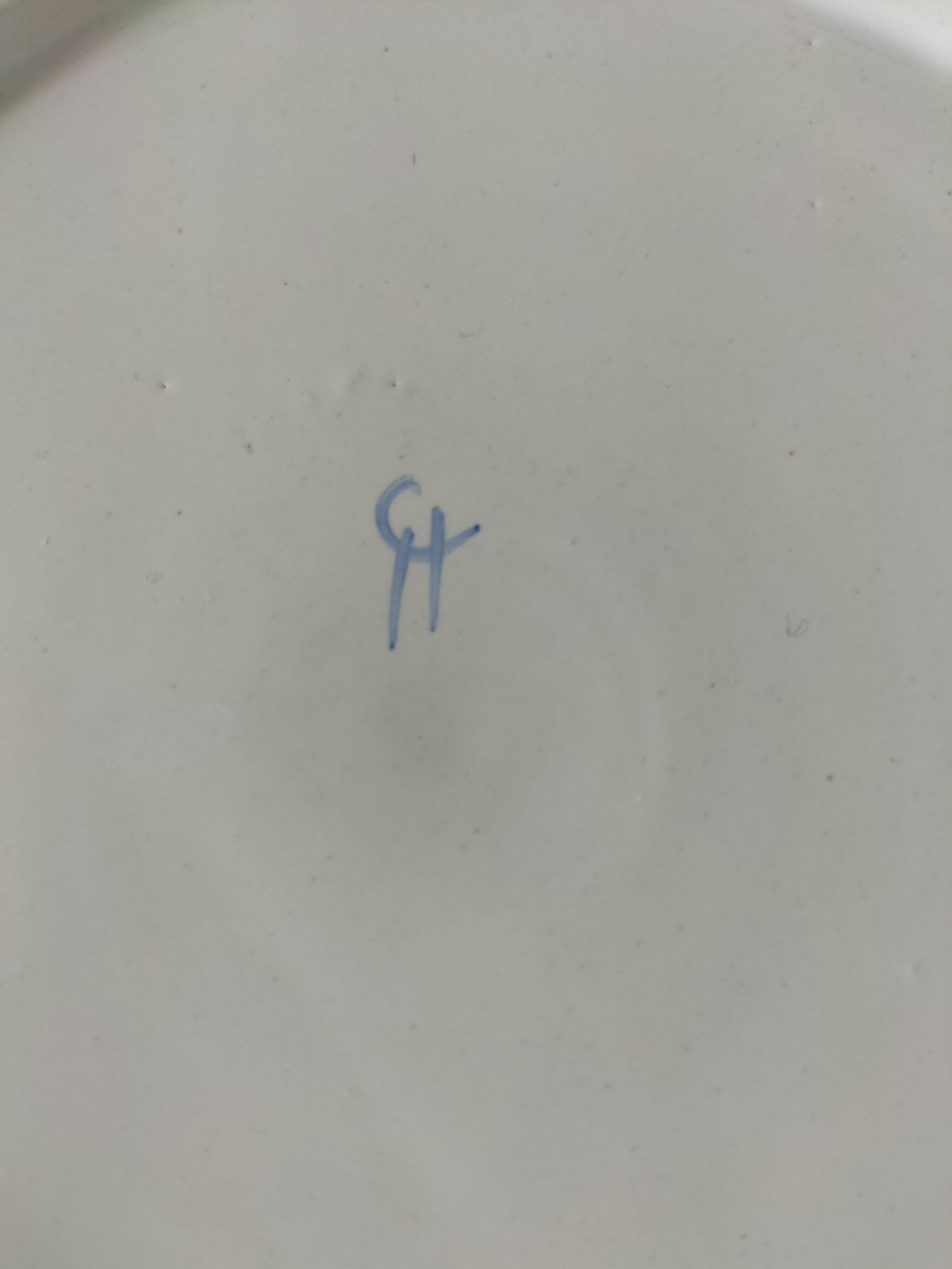 Trio of antique hand-painted plates