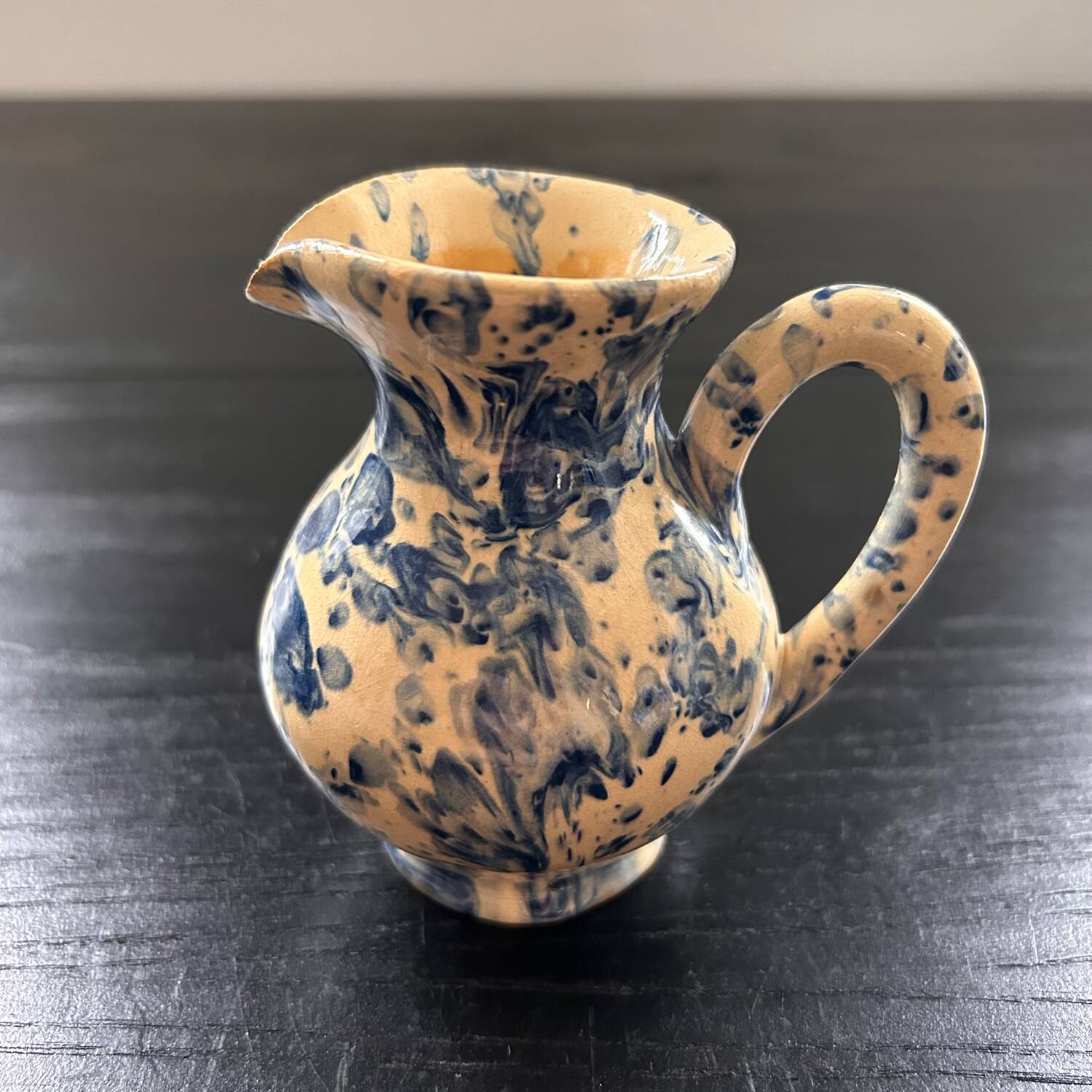 Small blue and beige mixed pitcher