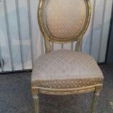 Golden lounge two armchairs and a gondola-shaped sofa and a pair of Louis XVI chairs