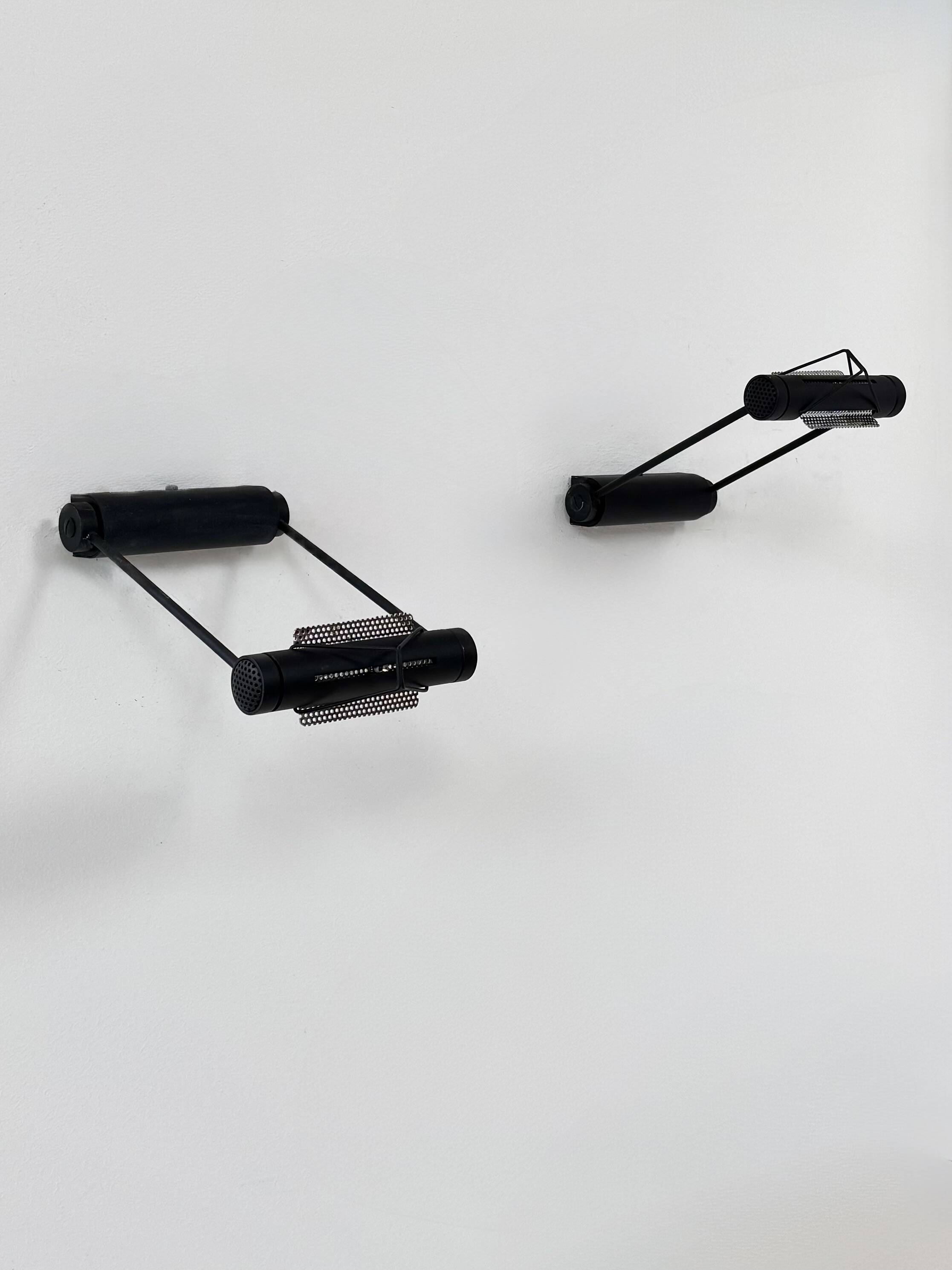 Pair of adjustable vintage wall lights, matte black metal, Italy, 1980.