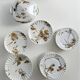 Haviland service, plates, pedestal dishes and soup tureen.