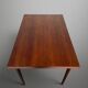 Scandinavian extendable dining table in teak