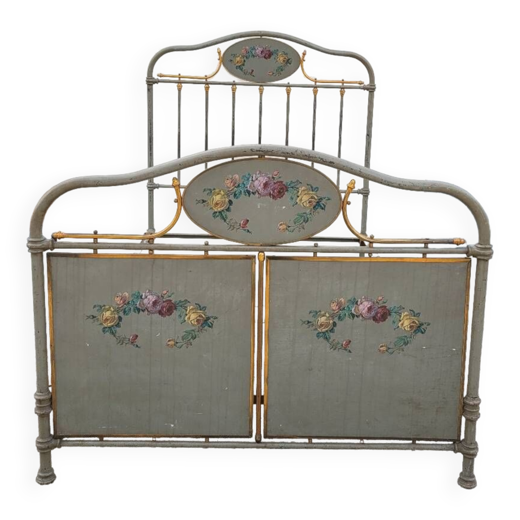 Cast iron bed decorated with flowers from the 19th century