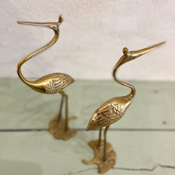 Couple of brass herons
