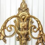 Bronze wall sconce in Empire style