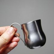 Set of 4 vintage bar measures in brushed stainless steel from the 60s-70s.
