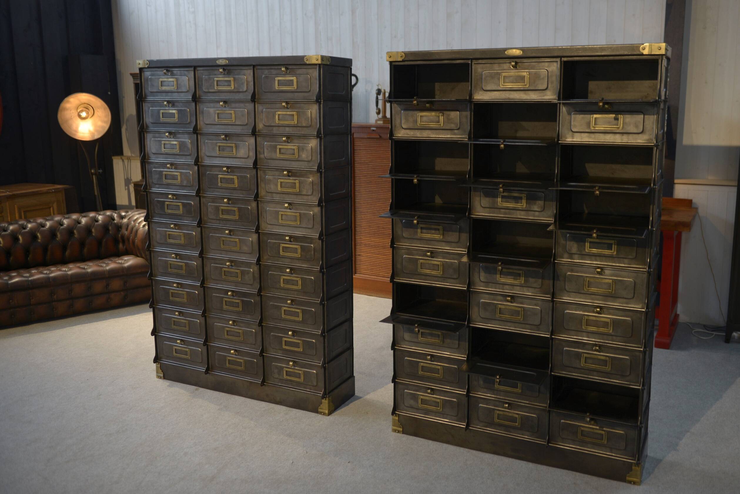 Pair of STRAFOR French cabinets with flaps, circa 1920s