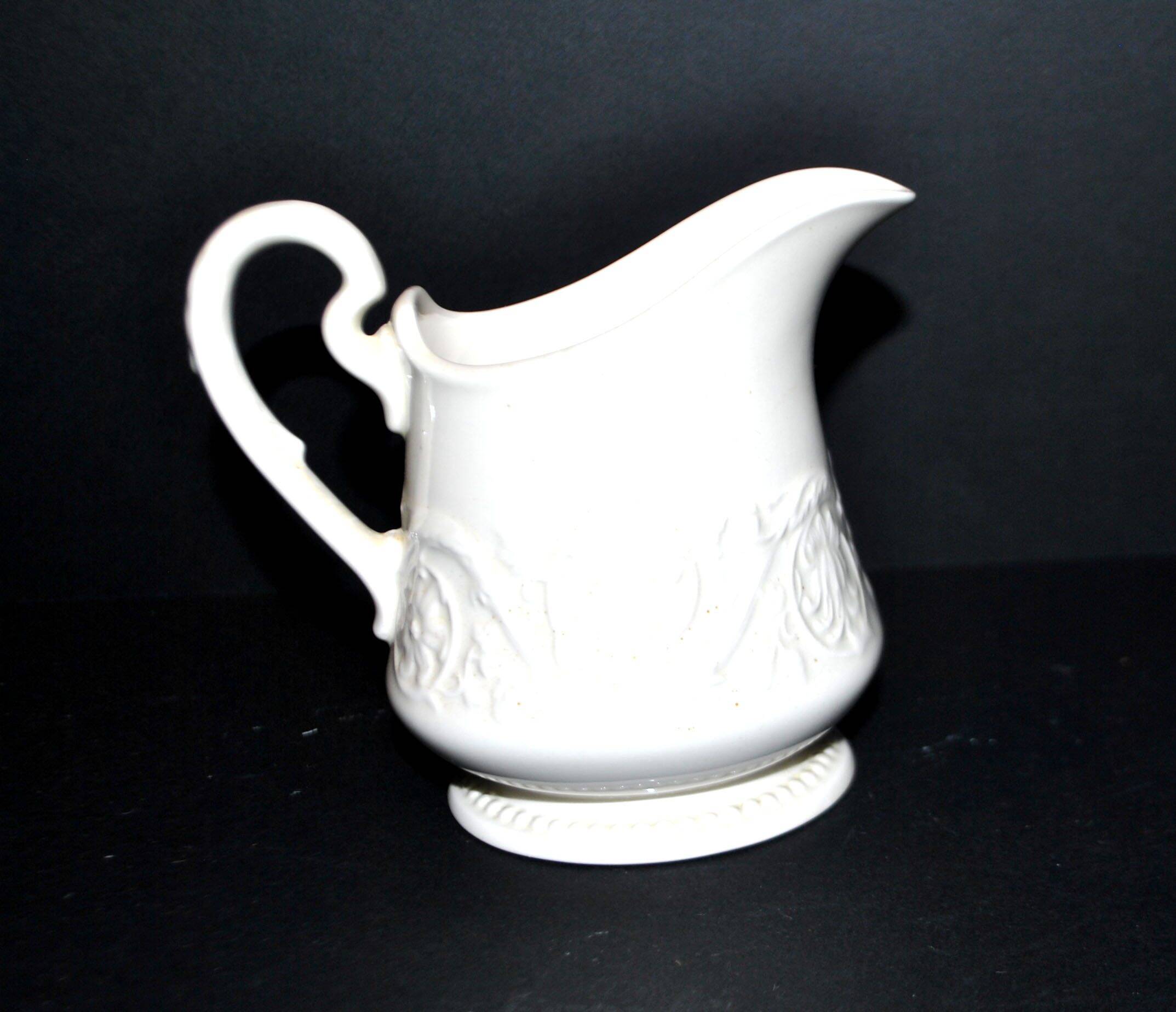 Wedgwood "Patrician" molded opaque earthenware pitcher, England Etruria Barlaston
