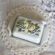 Large vintage earthenware and slip butter dish with fruit motif