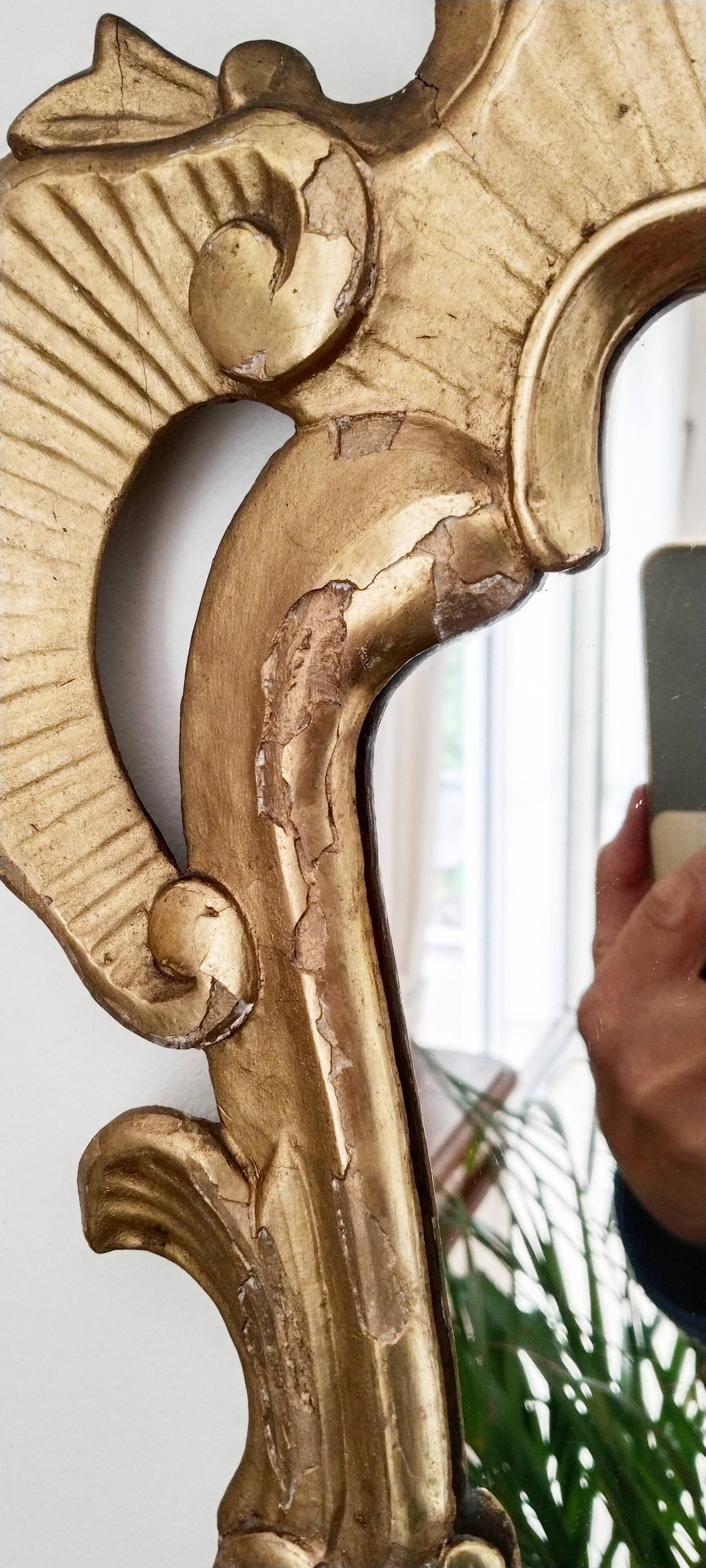 Mirror carved in gilded wood, 19th century