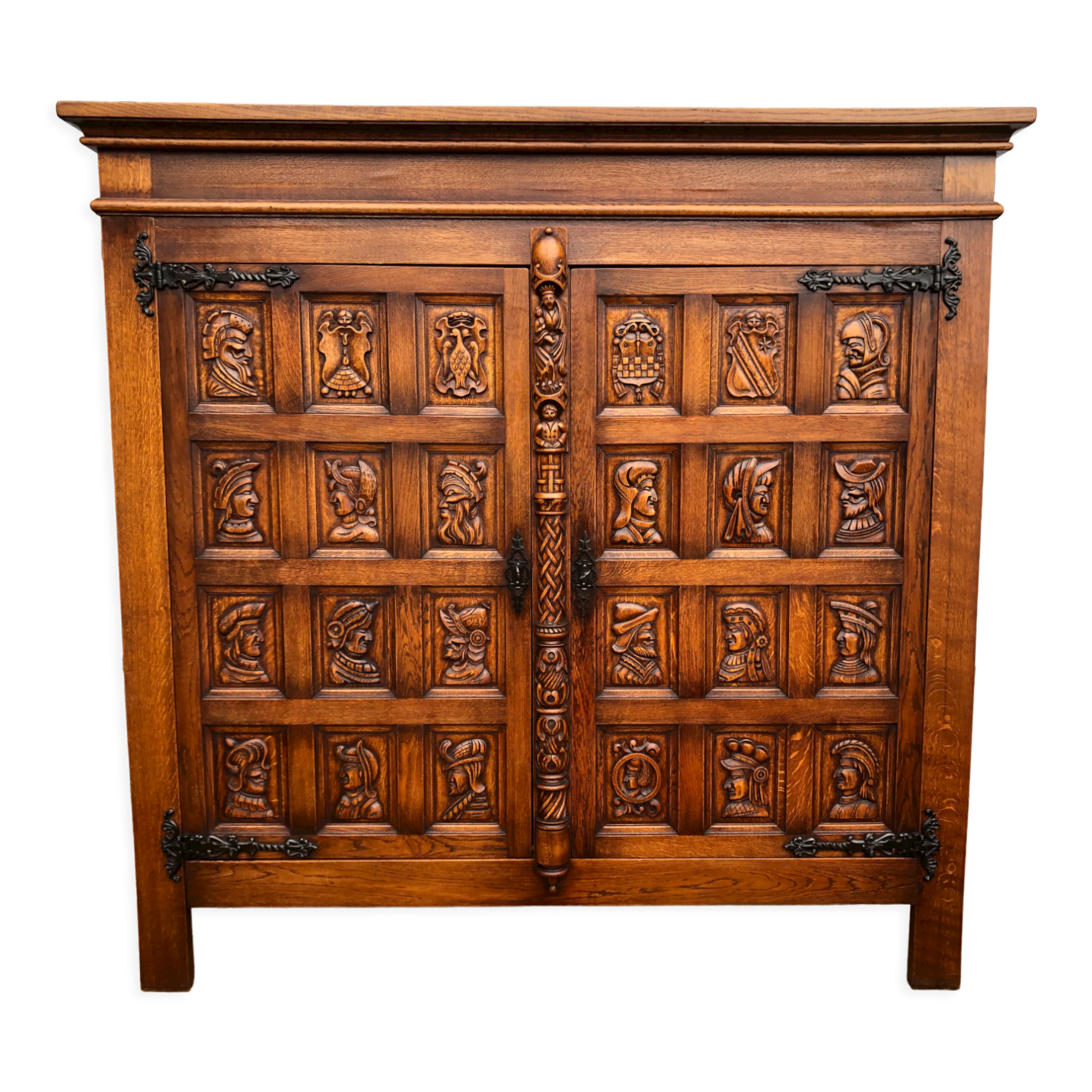 Spanish furniture with carved wood profiles and coats of arms from the 1950s.