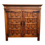 Spanish furniture with carved wood profiles and coats of arms from the 1950s.