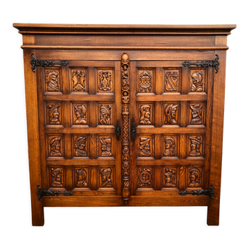 Spanish furniture with carved wood profiles and coats of arms from the 1950s.
