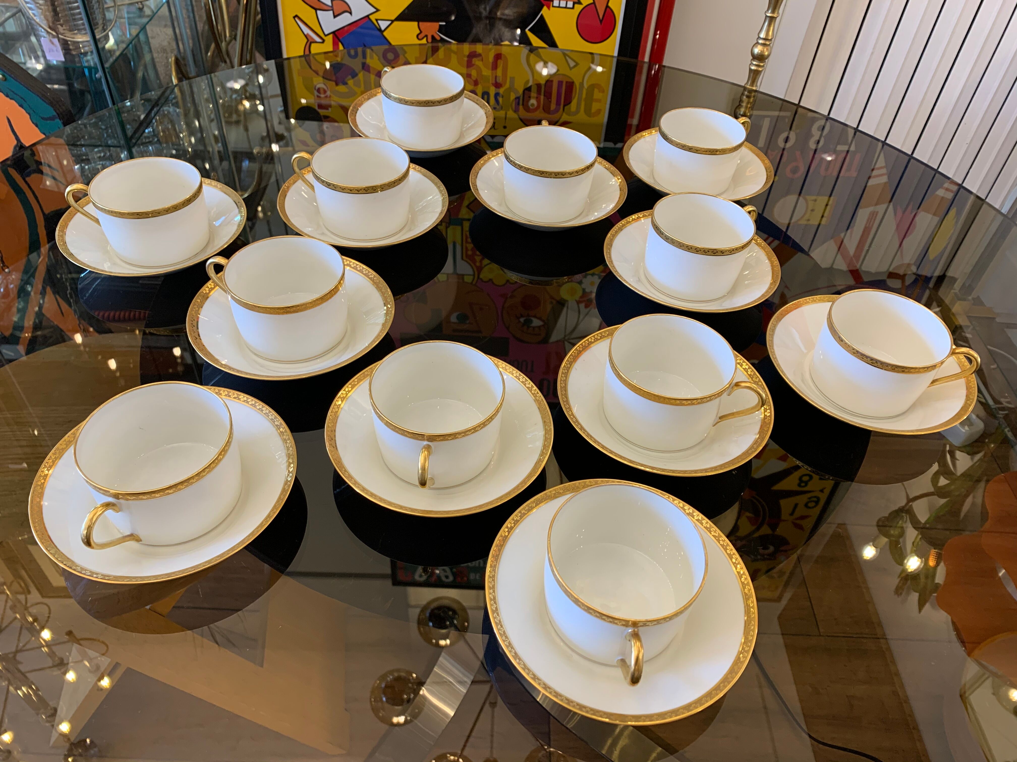 12 coffee cups and 12 white porcelain cups of Gold Gold Limoges