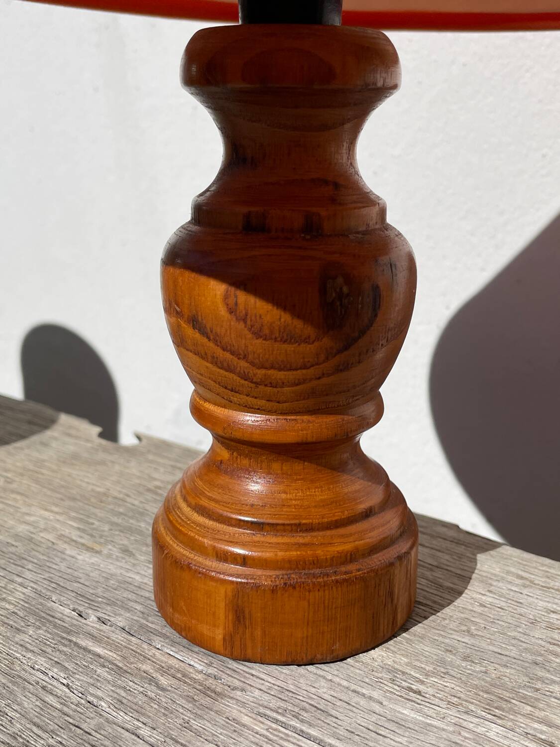 Pair of orange turned wood lamps