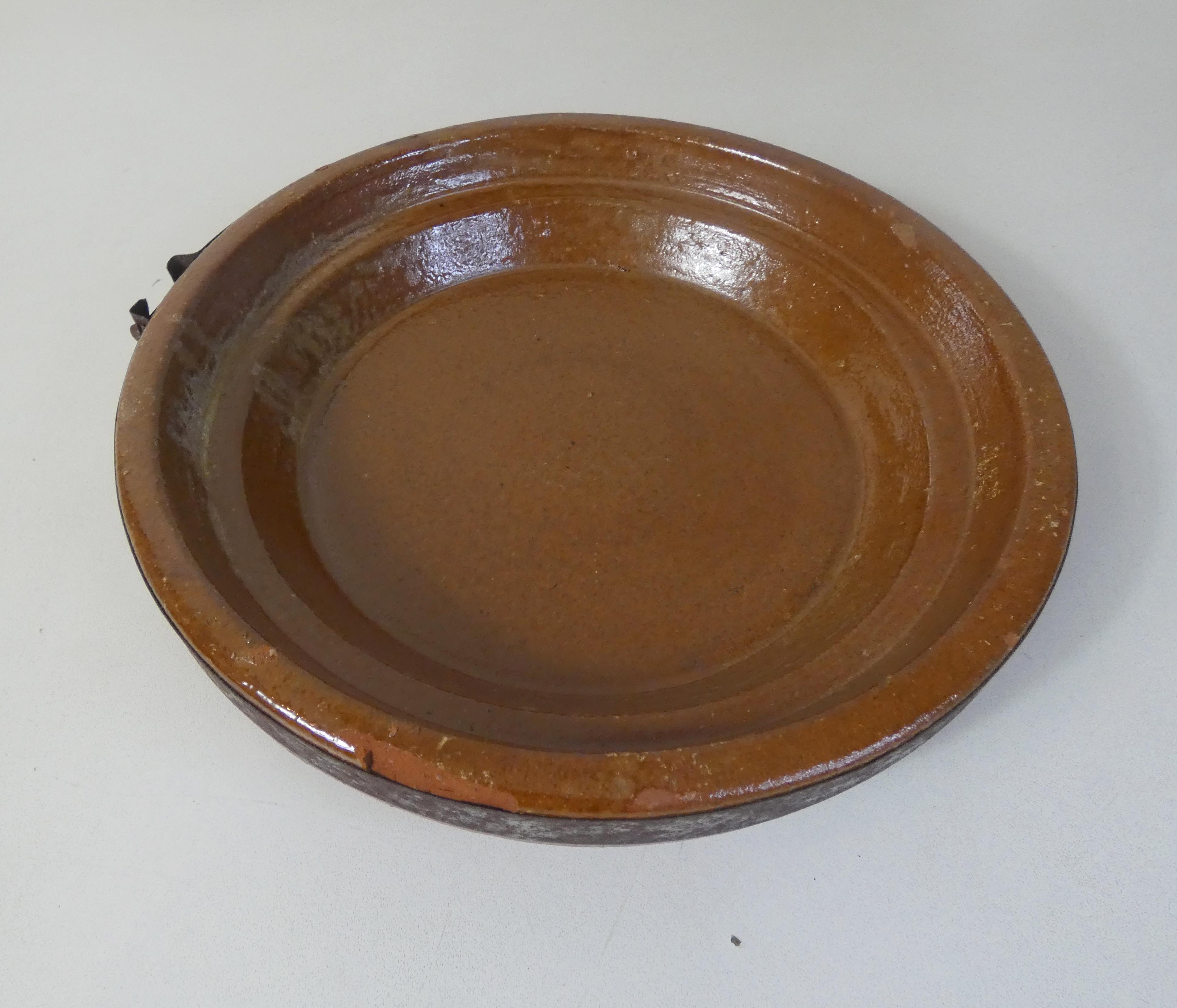 Old glazed terracotta tagine
