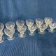 Set of 12 hand-sized crystal glasses with flower decoration