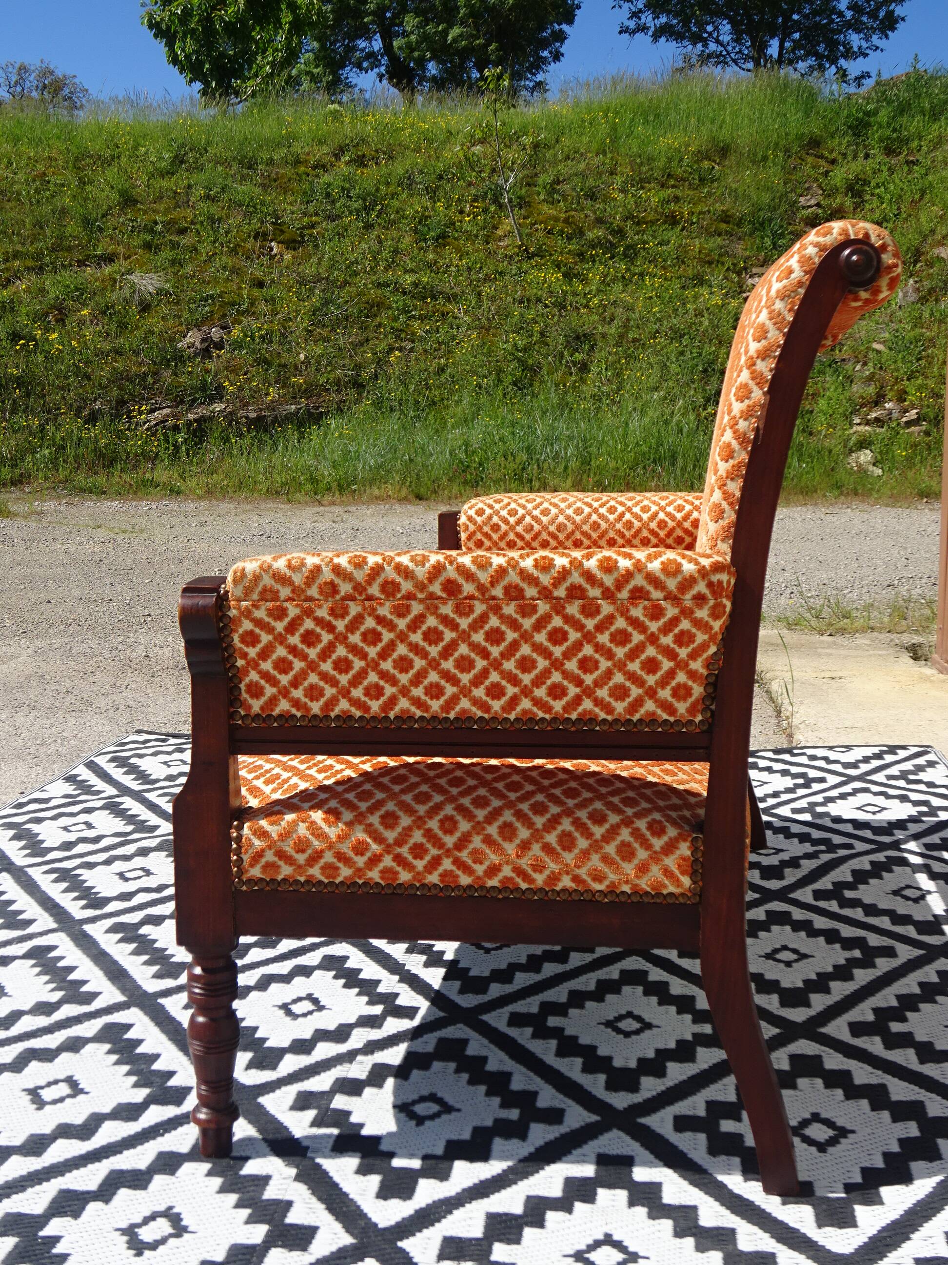 Old wooden and velvet bench