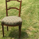 Antique chair seat upholsterer medallions