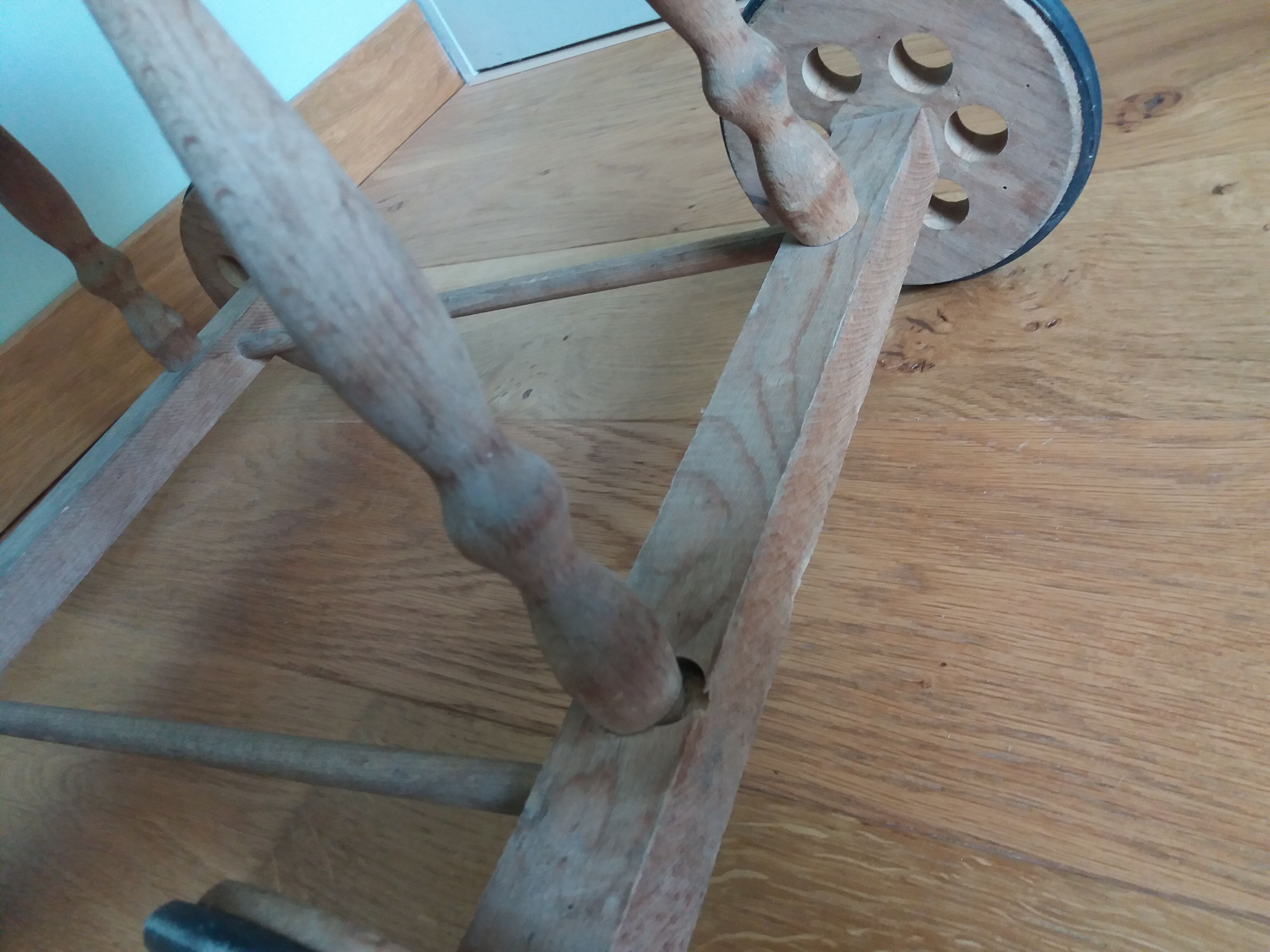 Wicker rattan doll cradle with wheels