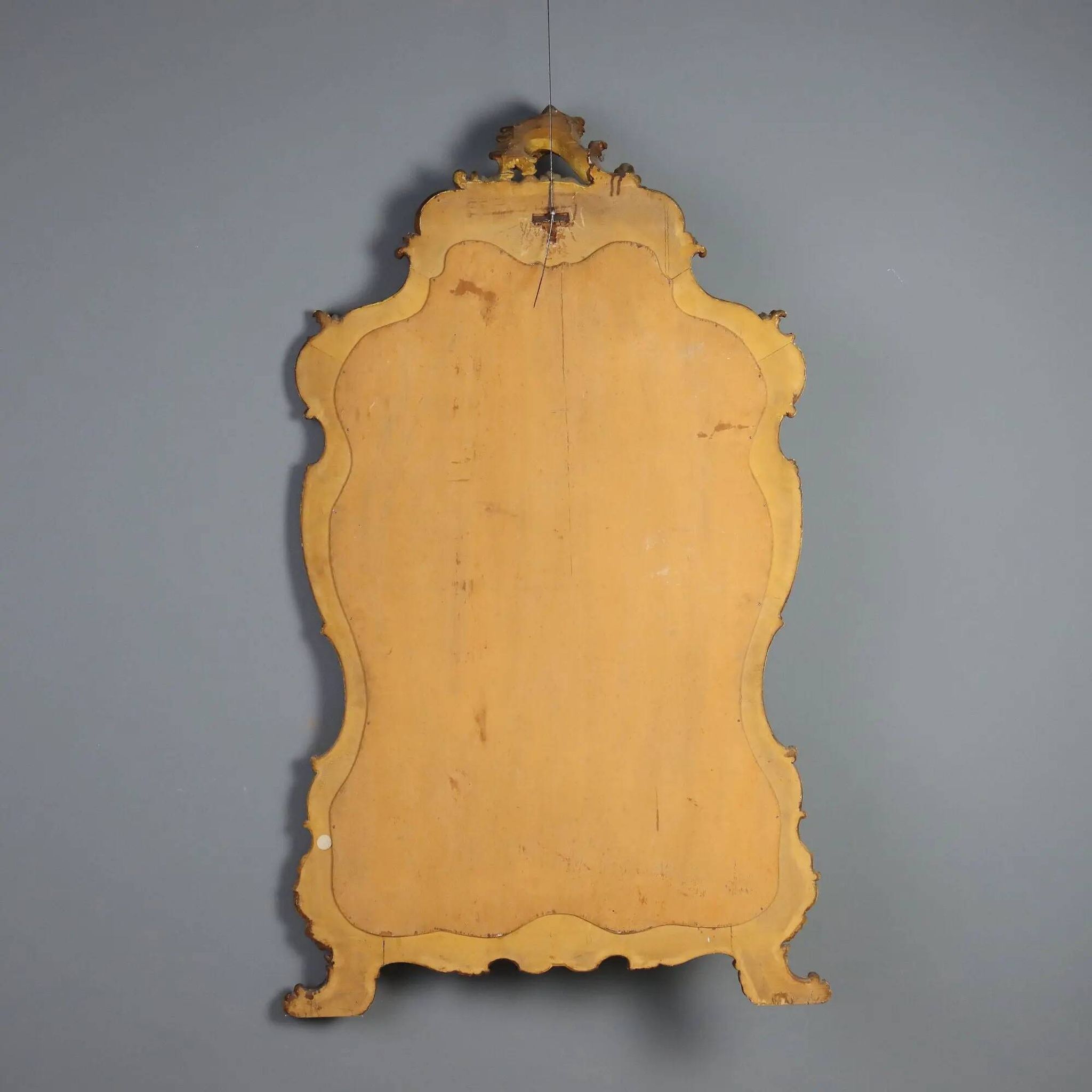 Antique baroque-style mirror in gilded carved wood, Italy 19th century.