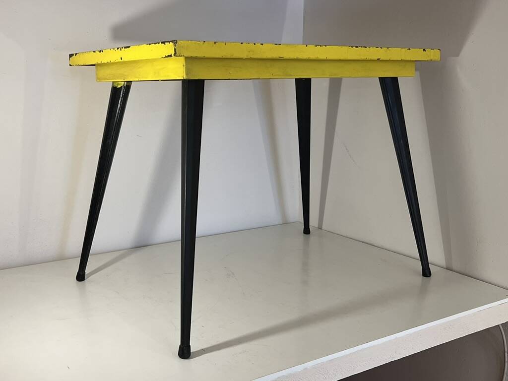 Table in the style of patinated yellow metal Tolix.