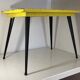 Table in the style of patinated yellow metal Tolix.
