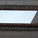 Oval mirror in rattan