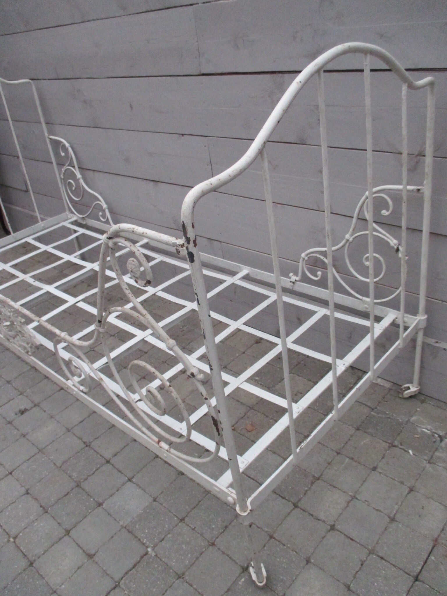Folding wrought iron bed
