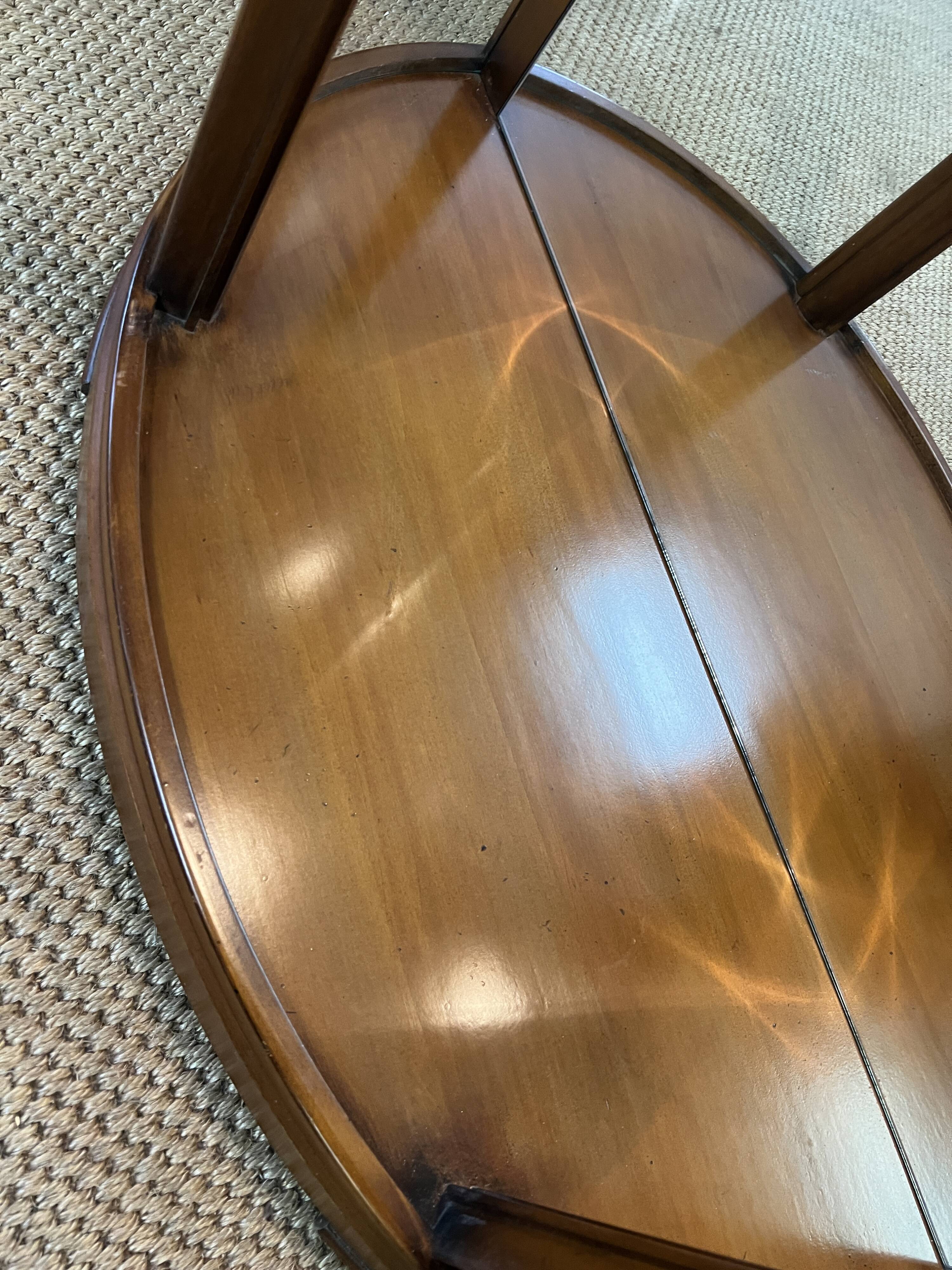 Wooden display case and half-moon mirror