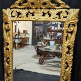 Large italian mirror in carved and gilded wood