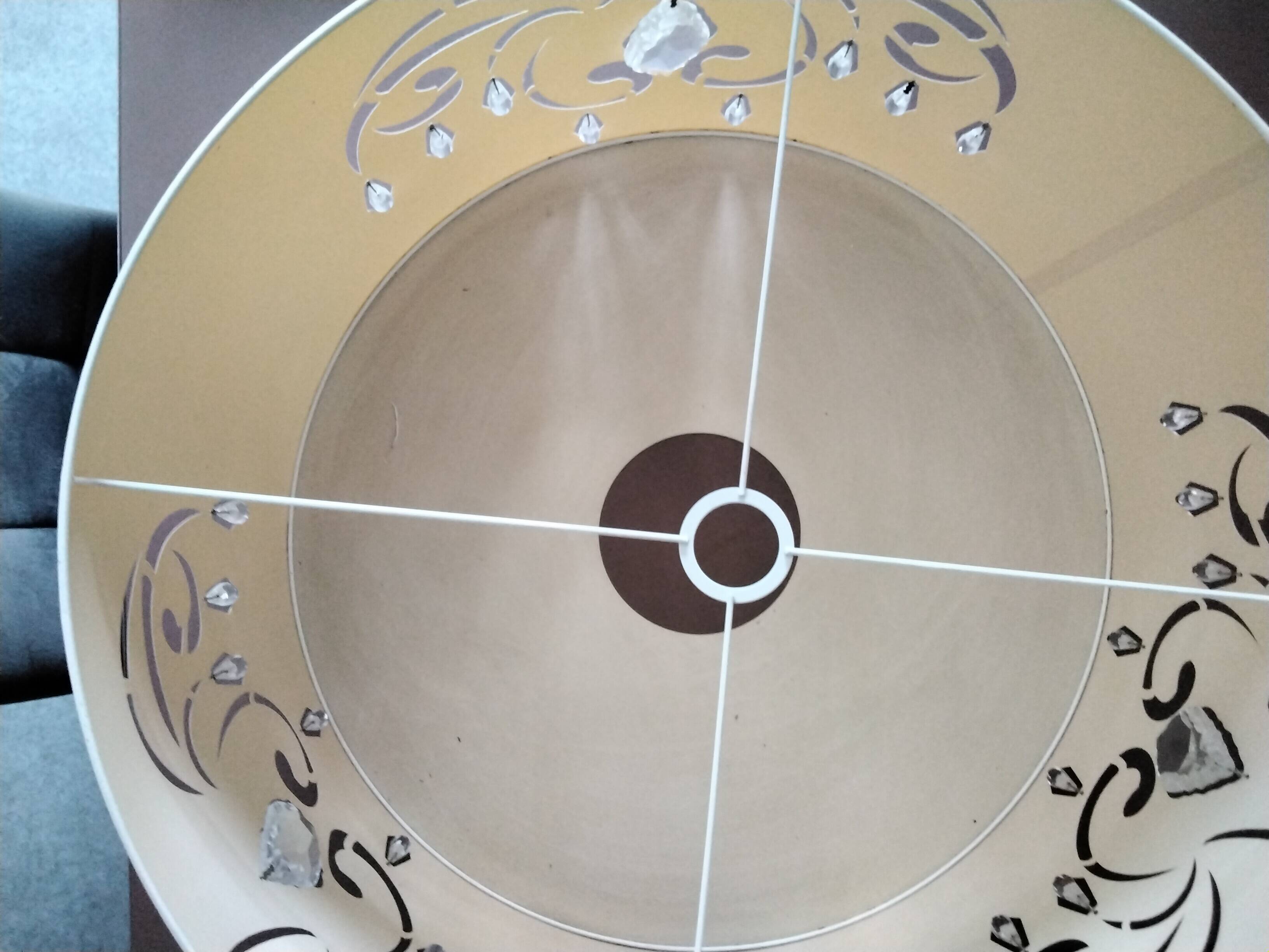 Beige fabric lampshade with crystal inlay.