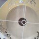 Beige fabric lampshade with crystal inlay.