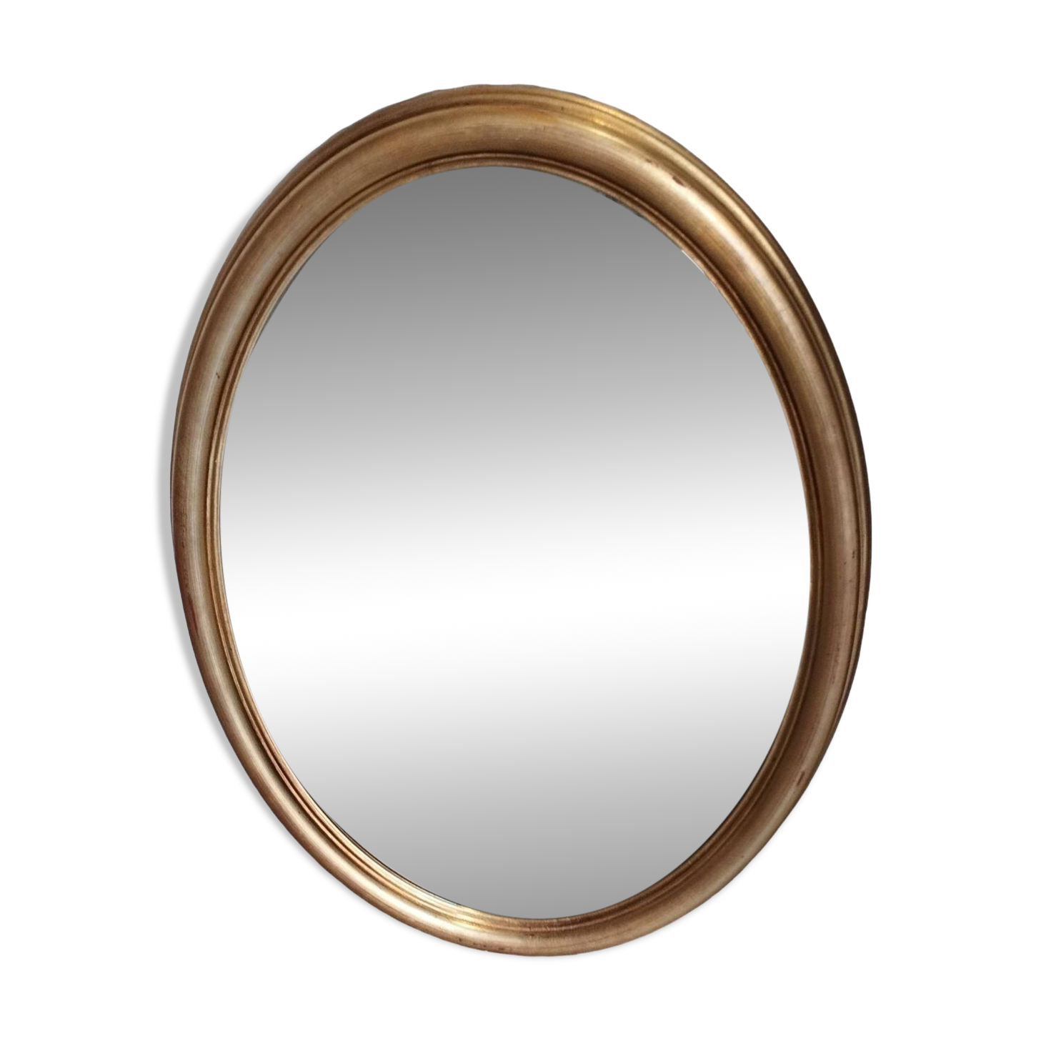 Grand et élégant miroir doré ovale avec sa glace biseauté
