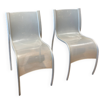 Pair of fpe chairs by ron arad for kartell translucent gray italy