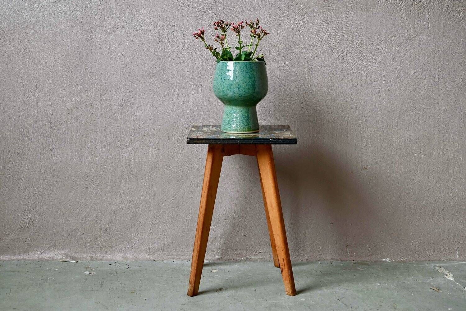 Plant stand side table 1970s Scandinavian patterns with tapered legs.