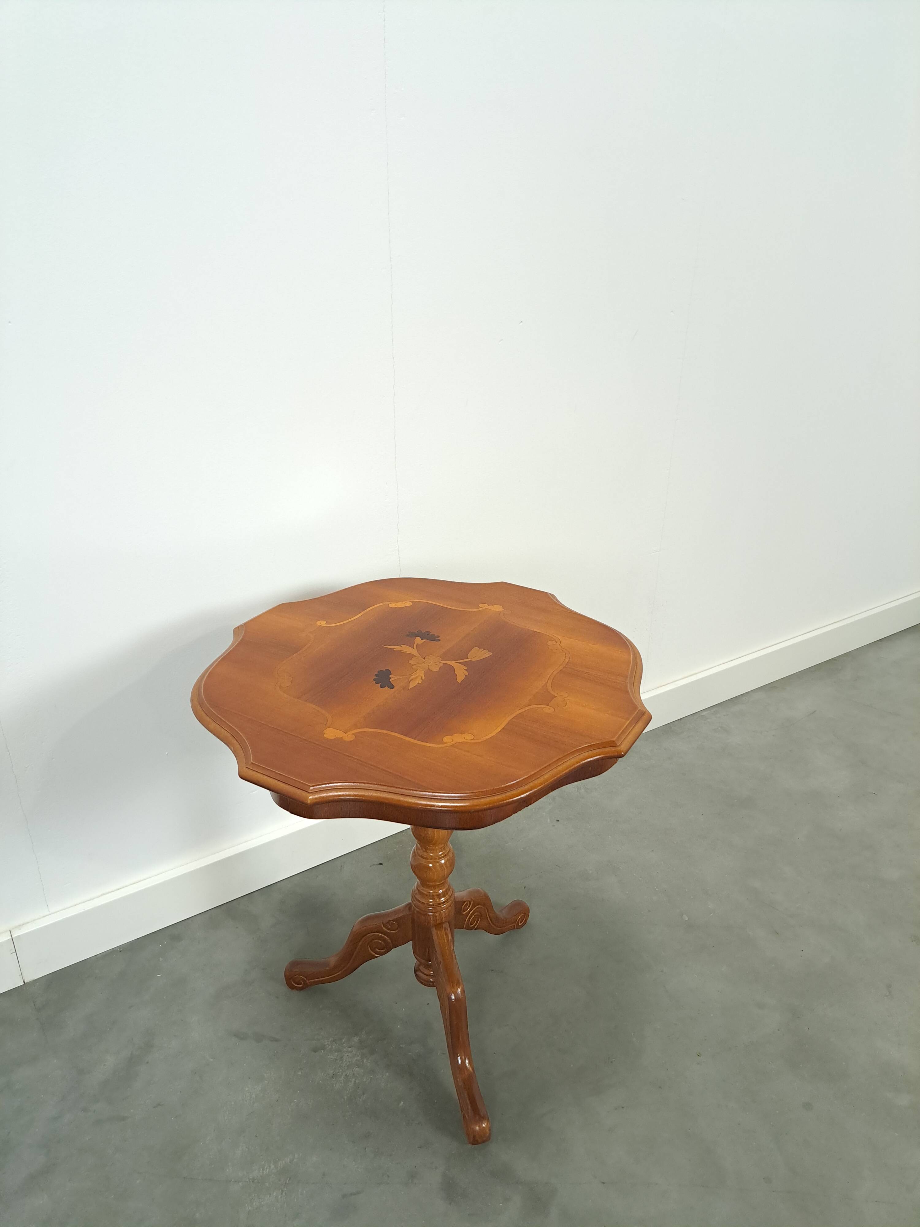 Round vintage wooden side table with inlaid veneer