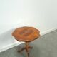 Round vintage wooden side table with inlaid veneer