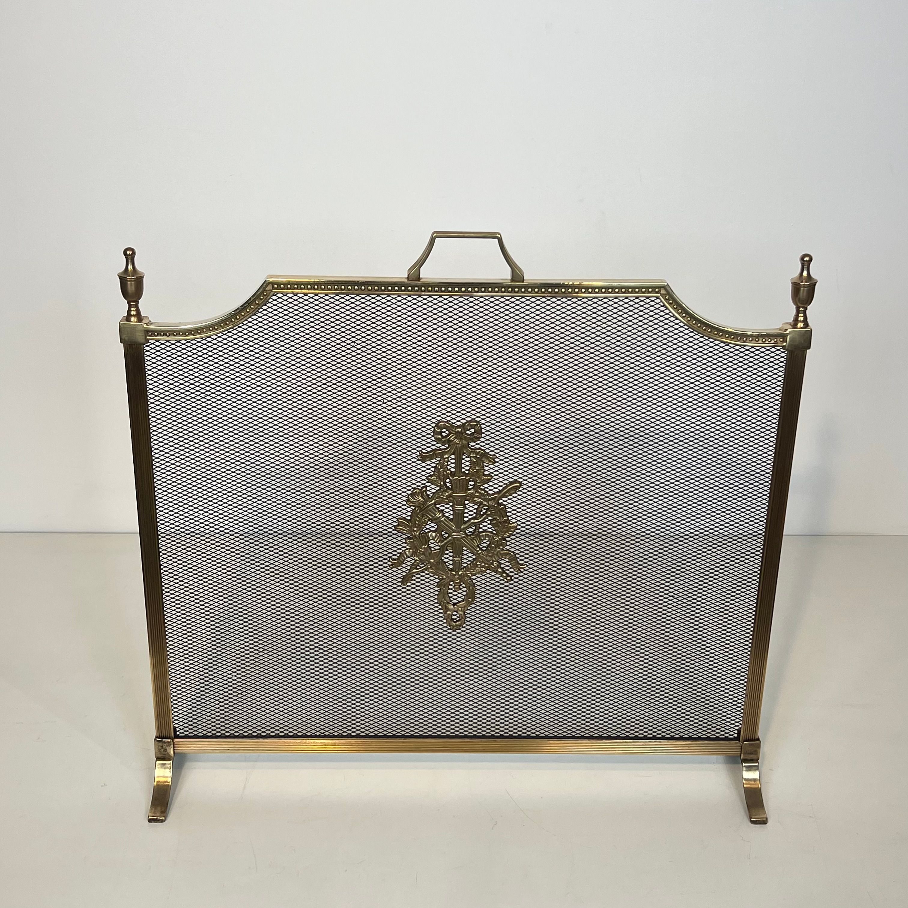 Brass fire screen and grille in the Louis XVI style in the taste of Maison Jansen.