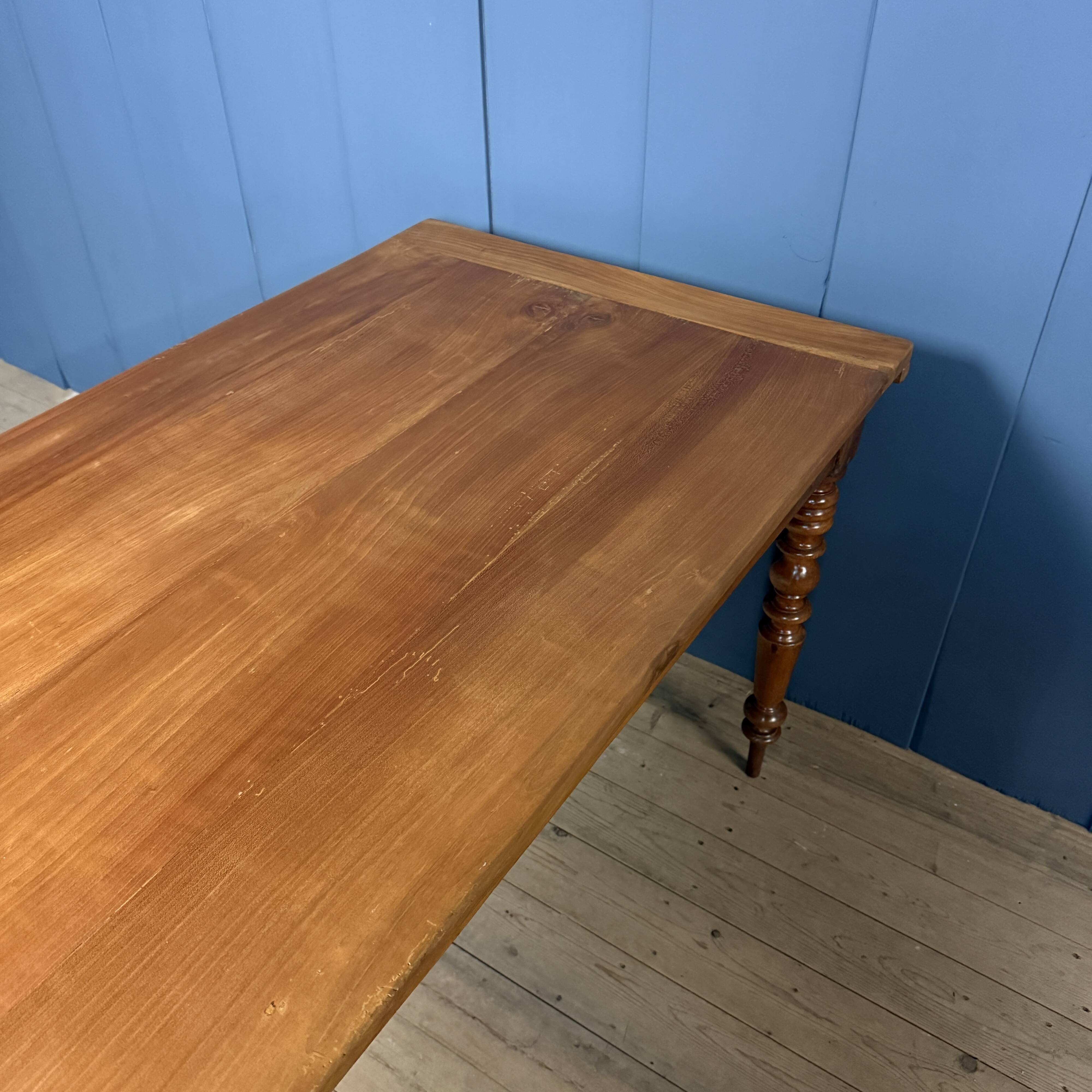 Antique cherry wood dining table from France.