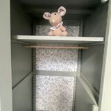 Asymmetrical cabinet