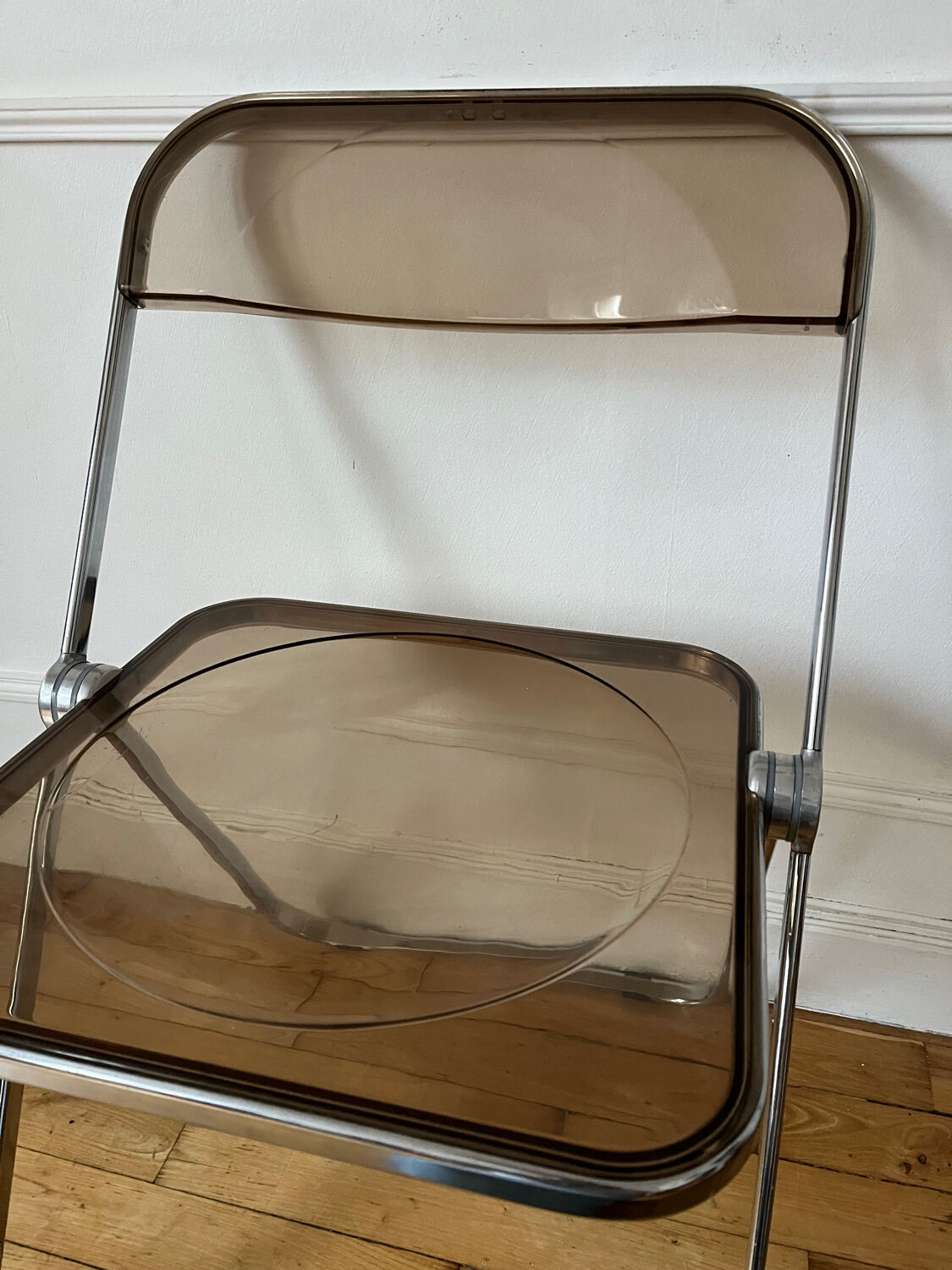 Plia folding chair by Giancarlo Piretti Castelli