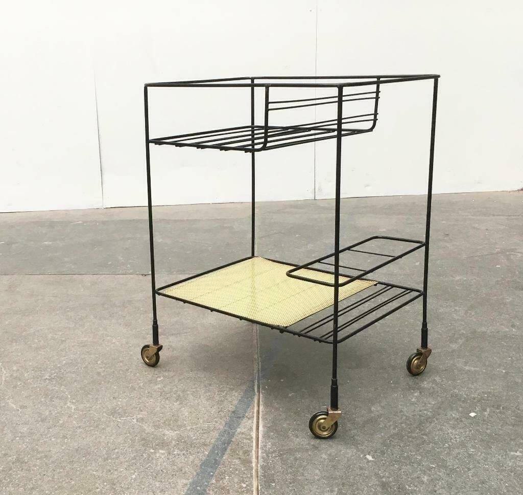 Minimalist perforated metal serving trolley in mid-century style, 1960s.