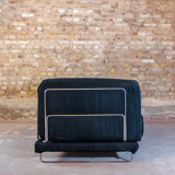 Black fabric design sofa with chromed steel frame