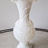 White opaline vase decorated with arabesques and ram's heads