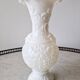 White opaline vase decorated with arabesques and ram's heads