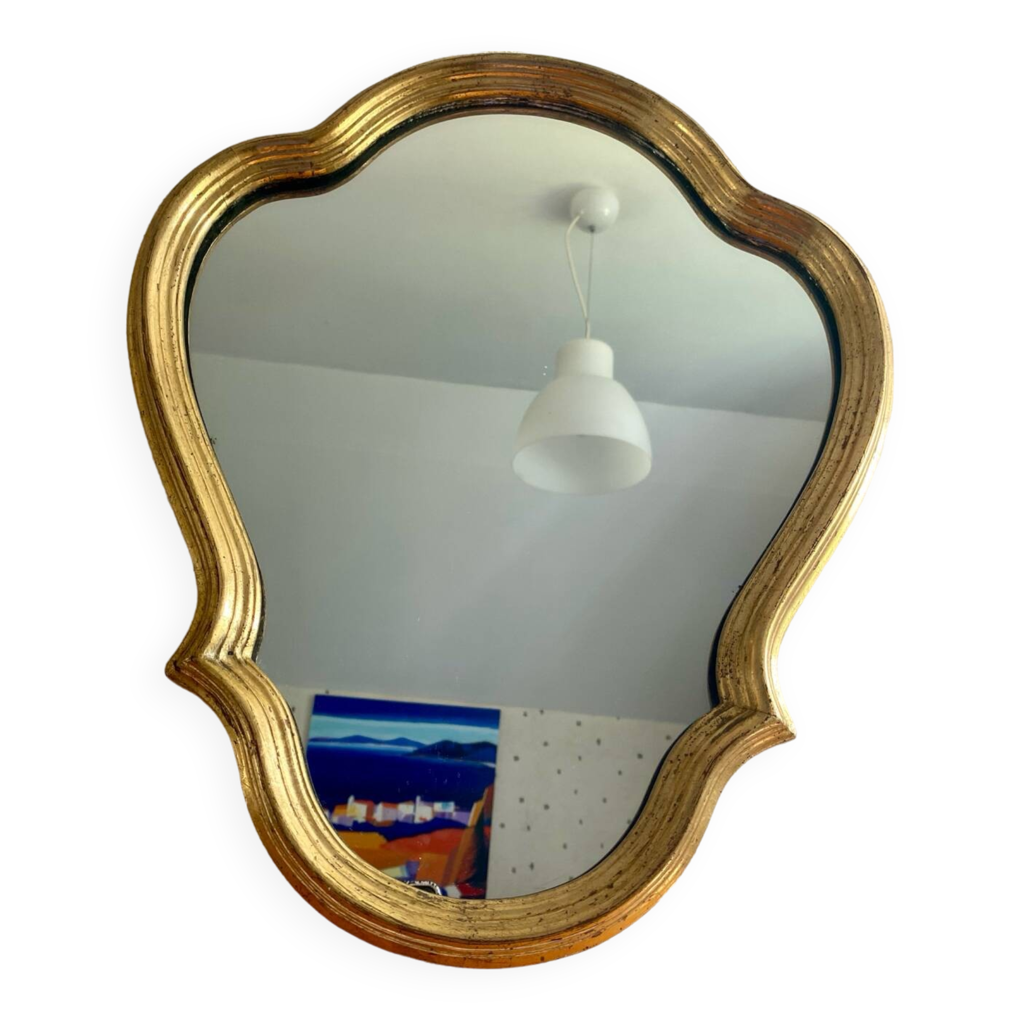 Wall mirror in a gilded wooden frame